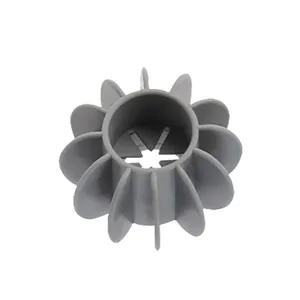 Grey plastic anti-tangle laundry ball detail view, flower shaped washing machine tool.