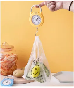 Handheld spring hanging scale for kitchen, portable 10kg mechanical food weighing tool.