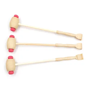 Detailed view of wooden massage hammer with pink silicone head and back scratcher handle.