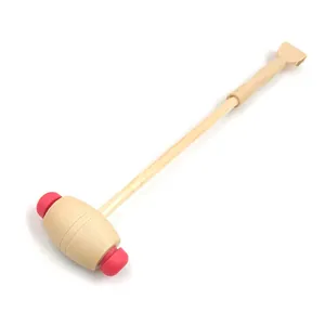 Wooden massage hammer and back scratcher detail view, dual-use wooden wellness health tool.