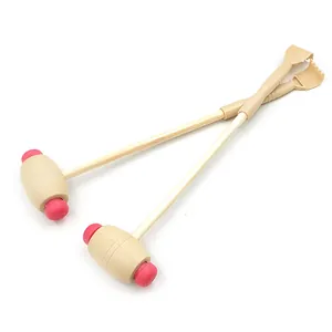 Wooden handle massage hammer and back scratcher dual-use health tool for daily relaxation.