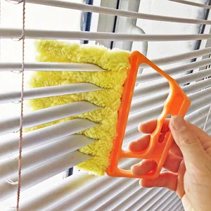 Handheld window blinds cleaner brush with microfiber yellow head for dust removal.