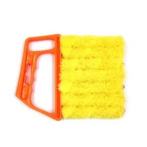 Detailed close-up of multi-layer soft plush blind cleaning brush for AC vents and gaps.