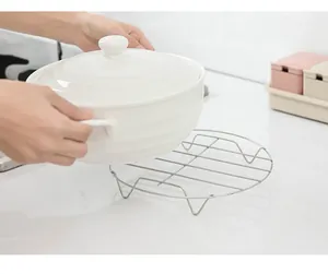 Roestvrijstalen keuken stoomrek detailweergave, multifunctioneel kookgereedschap voor thuis.