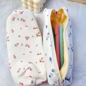 Jolie trousse à crayons florale en tissu, sac de rangement de papeterie mignon et frais.