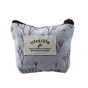 Canvas coin purse with floral print, mini zipper key pouch for daily use and travel.