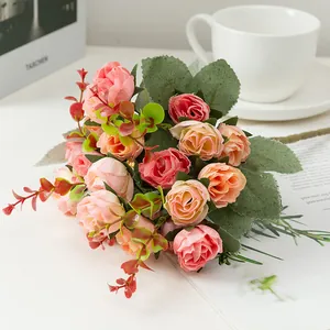 Detailed shot of artificial silk rose bouquet featuring multi-head pink flowers for home decor.