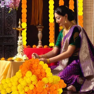 Lebendige orange und gelbe künstliche Ringelblumenketten für Diwali und Festdekoration
