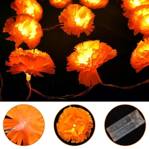 Vibrant orange marigold flower LED string lights for Day of the Dead festival decorations