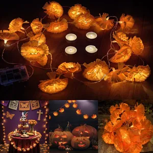 Warm orange artificial marigold LED string lights for Day of the Dead and Halloween