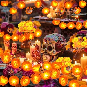 Decorative LED marigold flower string lights for Day of the Dead altar setting.