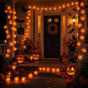 Marigold flower LED string lights decorating a Halloween porch with pumpkins and skeletons