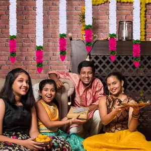 Decorative artificial jasmine and lotus bud garlands for traditional Indian Diwali festivals.