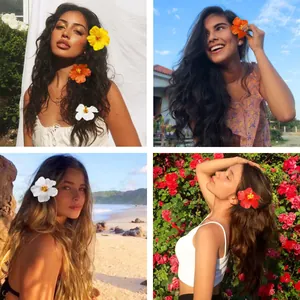 Models wearing colorful artificial hibiscus flower hair clips for Hawaii beach parties.