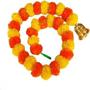 Detail of artificial orange and yellow marigold flower string with a small decorative golden bell