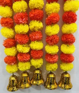 Vibrant orange and yellow artificial marigold garlands with decorative golden bells