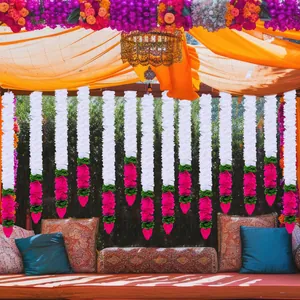 Artificial white jasmine and pink lotus bud garlands for traditional Indian wedding decor