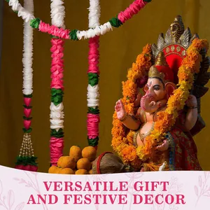 Traditional Indian Diwali decoration featuring jasmine garlands and Ganesha idol scene.