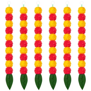 Six artificial marigold flower garlands for Day of the Dead decoration with green leaves