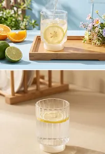 Close-up detail of heat-resistant vertical striped glass cup with elegant white base