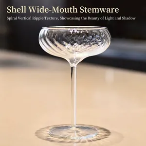 Elegant spiral ribbed wide mouth glass goblet for vintage cocktails and desserts