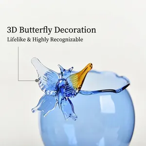 Elegant and creative blue glass wine cup with a lifelike 3D butterfly decoration