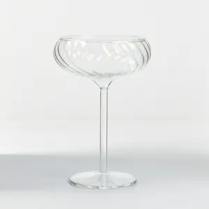 Elegant vintage French style ribbed cocktail glass with a tall stem and clear finish