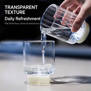 Modern ribbed heat-resistant glass cup with creamy white base for coffee or milk