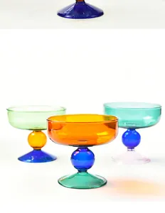 Vibrant mid-century modern colored glass bowls as creative home decor or incense holders.
