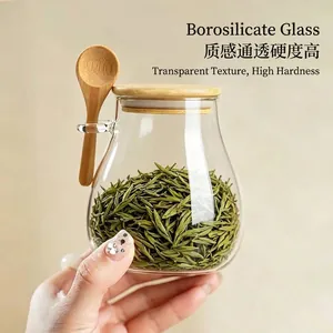 Japanese style borosilicate glass storage jar with bamboo lid and wooden spoon