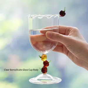 Elegant hand-held borosilicate glass goblet with cherry and pumpkin stem details