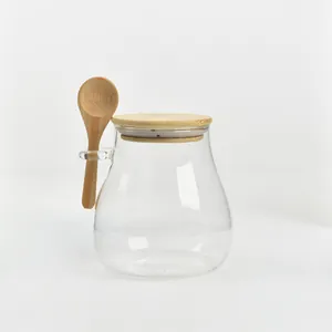 Minimalist Japanese glass storage jar with airtight bamboo lid and wooden spoon set