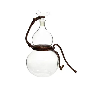 Elegant gourd-shaped glass wine bottle with stopper and decorative rope