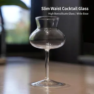 Elegant hourglass-shaped high borosilicate glass cocktail goblet with a wide base.