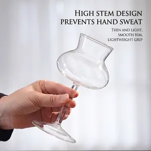 Elegant tall stem cocktail glass featuring a unique curved willow waist glass design