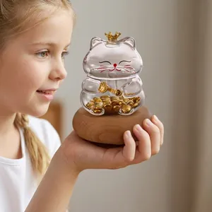 Tirelire chat porte-bonheur en verre transparent avec base en bois pour haricots d'or