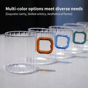 Set of modern ribbed borosilicate glass coffee mugs with colorful square handles