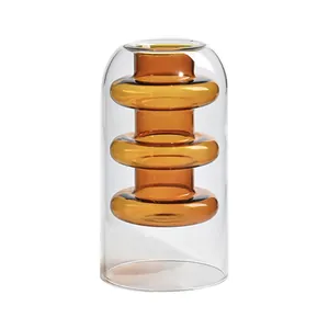 Modern double-layer glass aromatherapy bottle with elegant amber inner wave design decoration