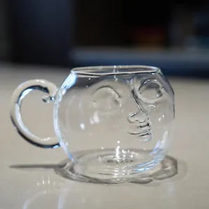 Creative funny human face clear glass mug for coffee milk juice and office daily use.
