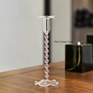 Vintage European glass bud candlestick with pink spiral stem for elegant home decor