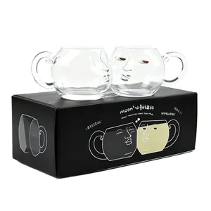 Creative funny face-shaped glass mug set for couples, ideal for coffee, juice or milk.