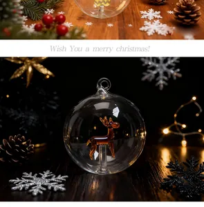 Close-up of a transparent Christmas ornament ball with a deer figurine inside