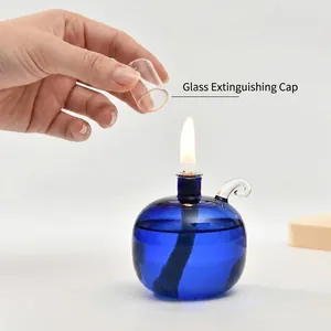 Minimalist spherical blue glass oil lamp with glass extinguisher