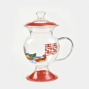 Traditional spittoon shaped glass mug with Double Happiness and Mandarin ducks pattern.