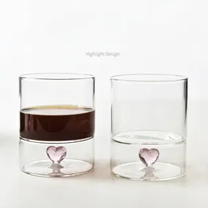 Creative transparent glass cup with 3D pink heart bottom for coffee or milk drinks