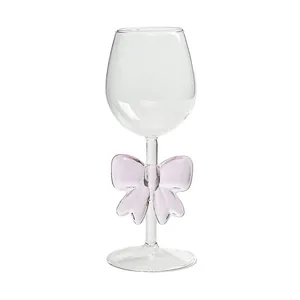 Creative borosilicate wine glass featuring a romantic purple bow-knot stem design for gifts