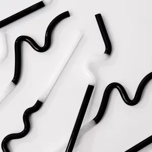 Creative artistic curved glass straws in black and white, reusable drinkware accessory