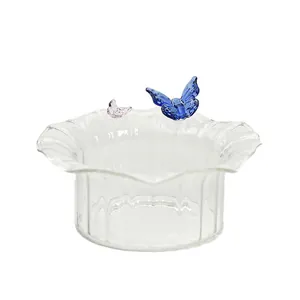 Elegant glass dessert bowl with blue and pink butterfly accents for ice cream and salads