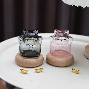 Bocaux de rangement décoratifs en verre en forme de chat noir et rose sur socles