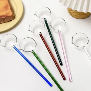 Cucharas de vidrio de borosilicato con mango largo para postres y té elegantes.